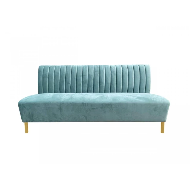 Stylish light green fabric gold sofa with comfortable armrests and wood accents in a studio setting