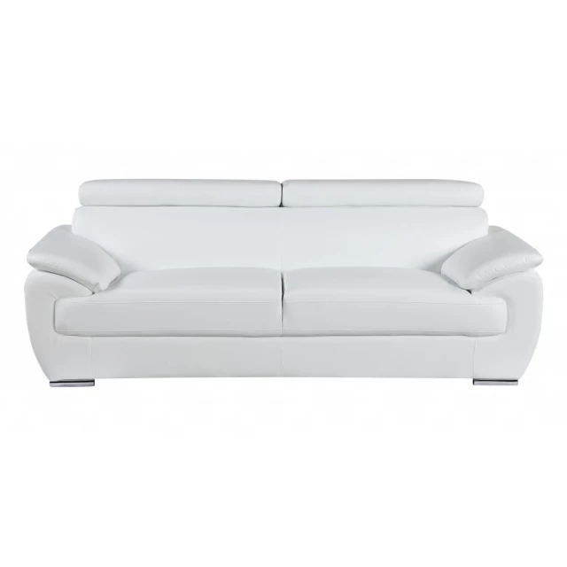 White silver leather sofa in a modern style with comfortable cushions and sleek design