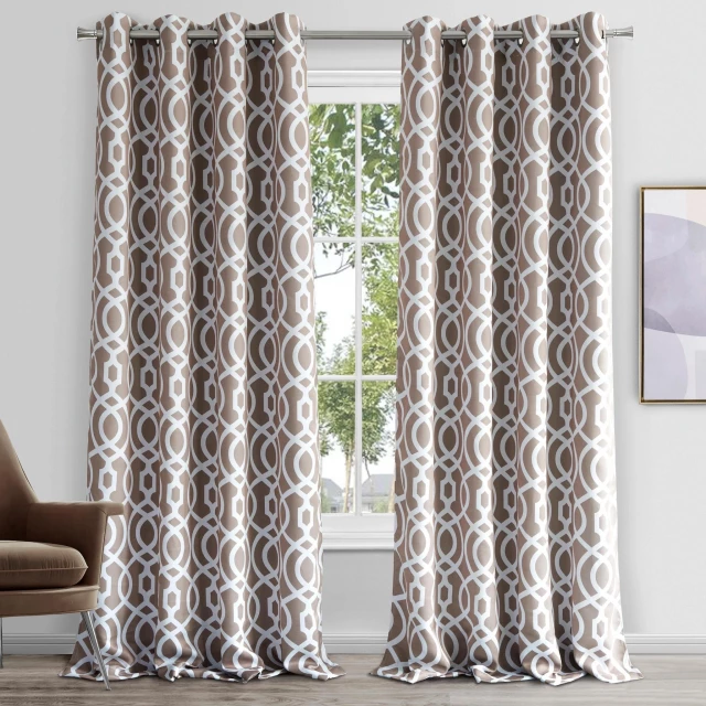 Taupe trellis black window curtain panel displayed on a wooden floor with a fixture shade