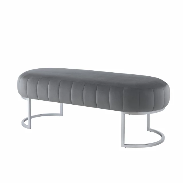 Gray upholstered velvet bench with metal legs and modern design