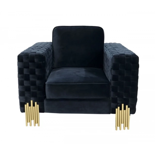 Black velvet gold solid armchair with wooden legs