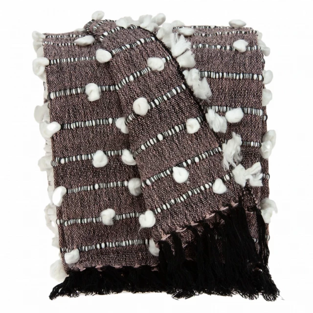 Image of reversible pink woolen throw featuring natural material and artful pattern