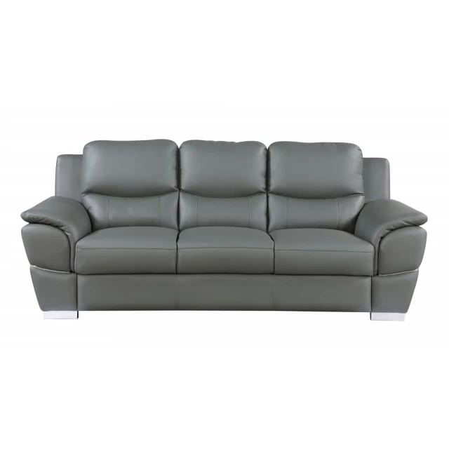 Gray silver leather sofa in a modern interior design setting