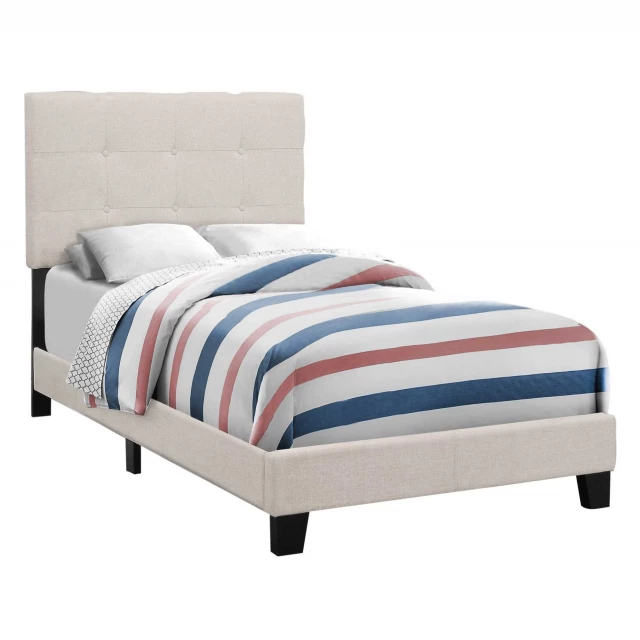 Beige upholstered linen bed with nailhead trim for elegant bedroom decor