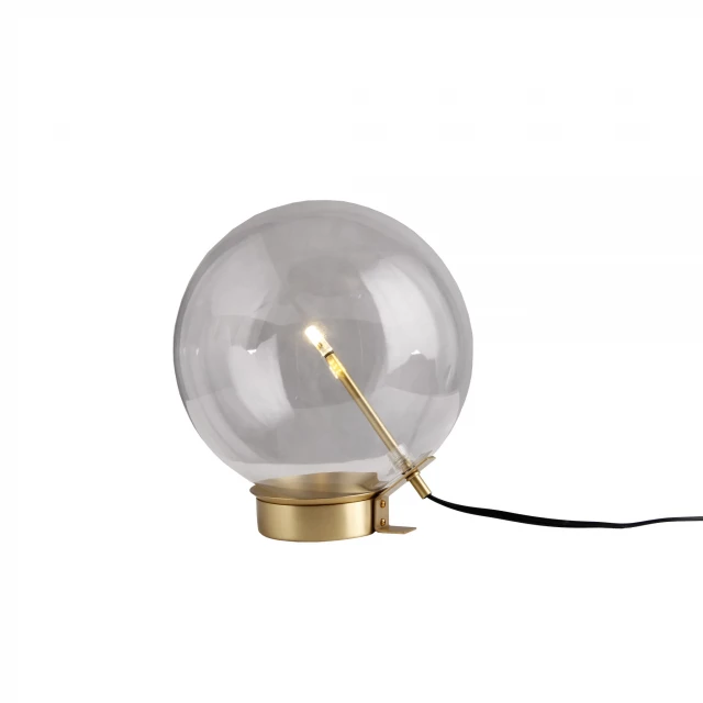 brass metal globe table lamp with circular design and metal finish