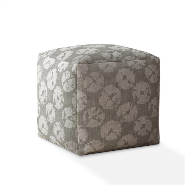 Gray canvas floral pouf ottoman with natural material in a rectangle shape fashion accessory
