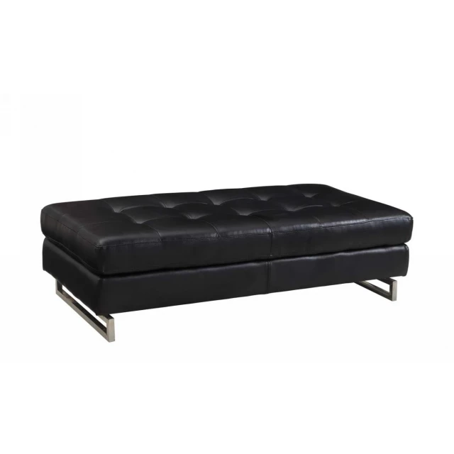Black faux leather silver ottoman with wood and composite material accents in a comfortable outdoor setting