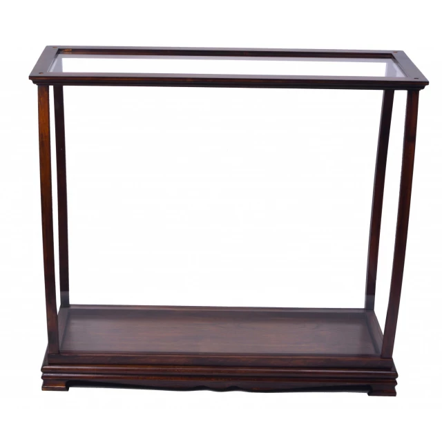 Brown clear glass standard display stand with natural wood and plant accents