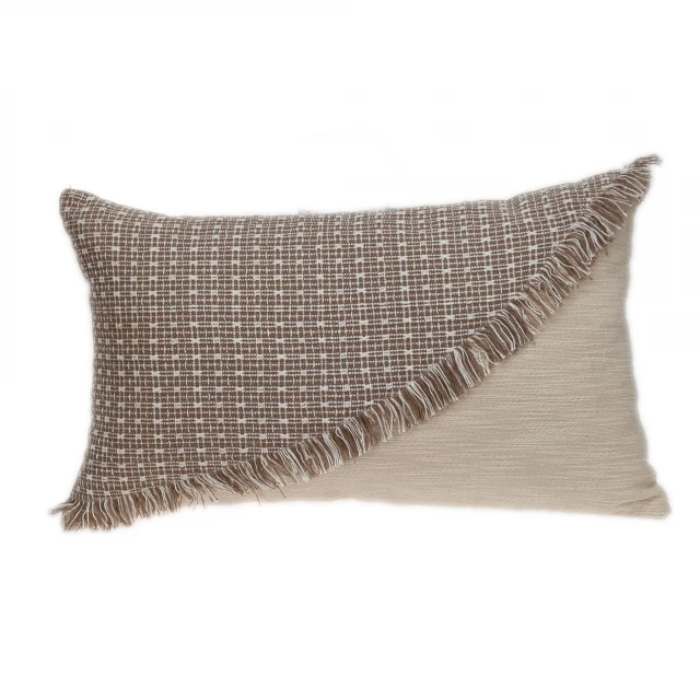 sandy beige textured throw pillow with patterned design and natural material accents