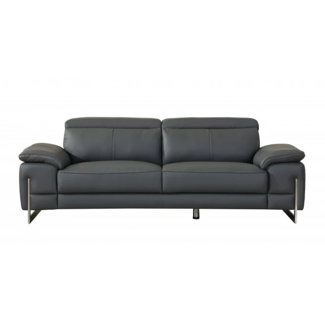 Gray silver Italian leather sofa in a modern style with comfortable cushions