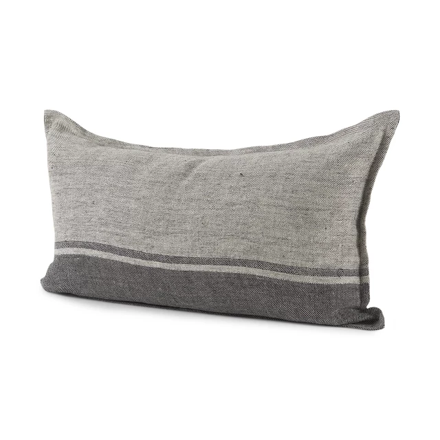 Dark gray lumbar throw pillow cover on couch with wood accents and fashion accessory elements