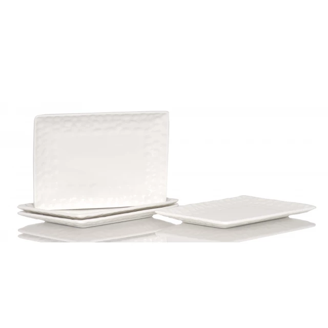 Pebbled porcelain service six salad plates in grey and beige on wood background