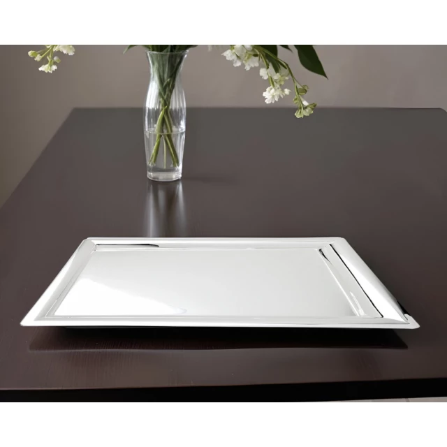 silver stainless steel serving tray with rectangle shape and tableware