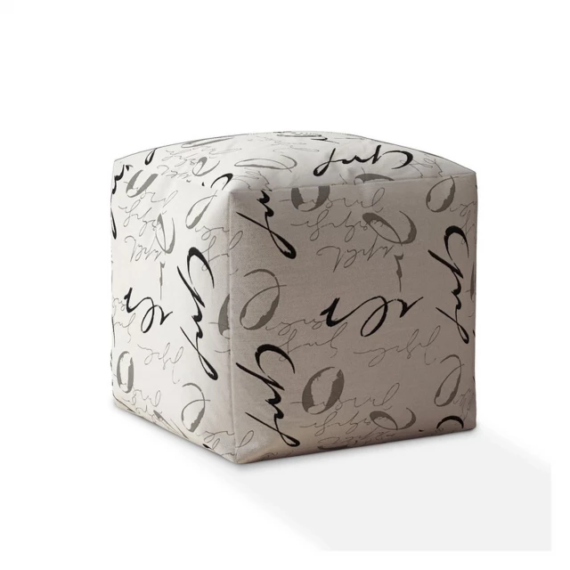 Black and gray polyester abstract pouf cover with artistic silver accents and plant motifs