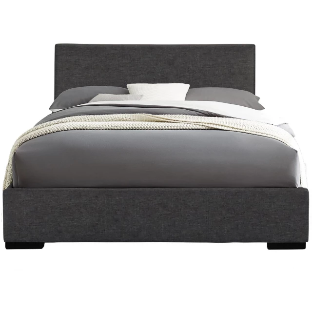Grey platform queen bed in a modern bedroom setting