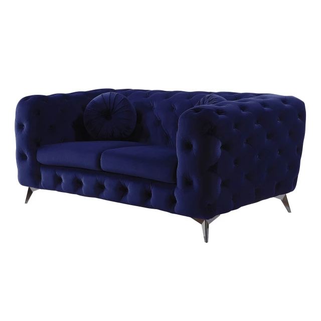 Blue silver velvet loveseat with comfortable pillows and sofa bed feature