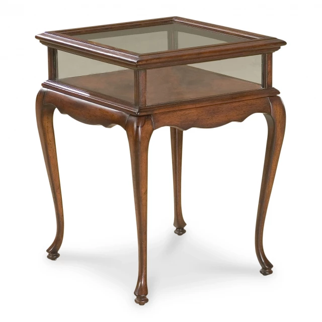 Dark brown glass rectangular end table with wood varnish finish in an outdoor setting