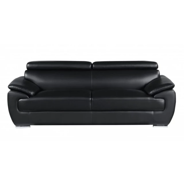 Black silver leather sofa with comfortable armrests and a versatile sofa bed design
