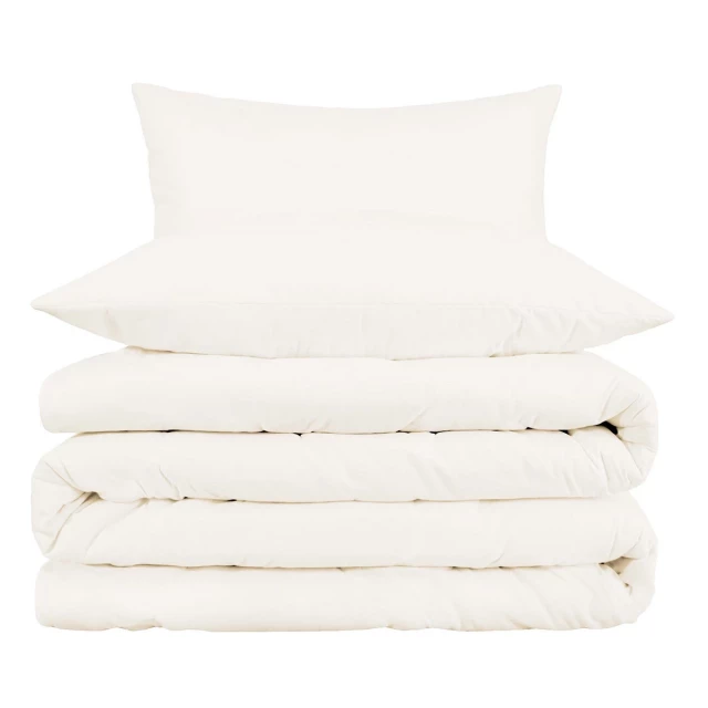 Blend thread count washable duvet cover in beige with wood and plant accents for a comfortable bedroom setting