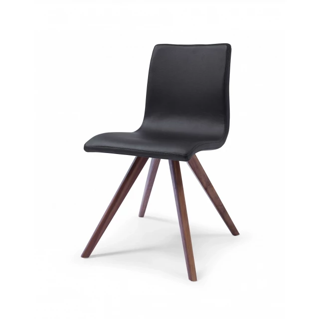 Black faux leather dining chairs with wood and plastic elements in natural shades