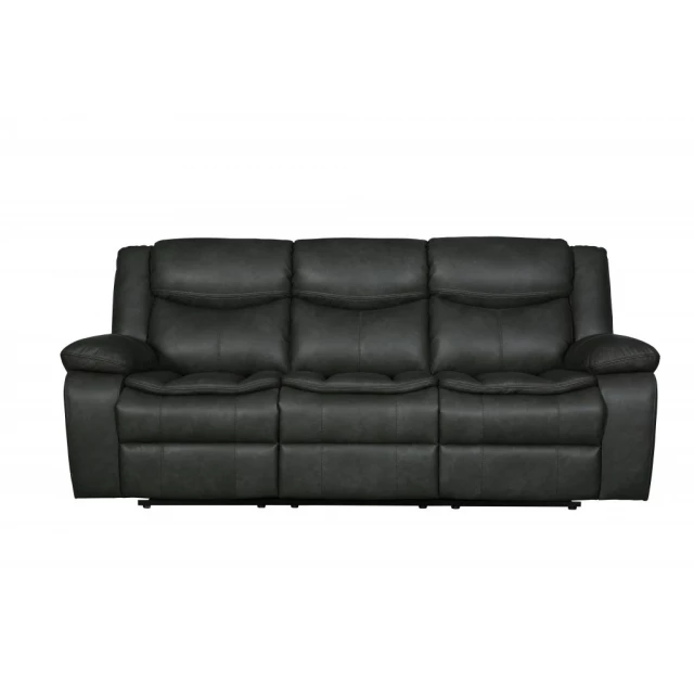 Gray black Italian leather sofa with comfortable studio couch design and wooden flooring detail