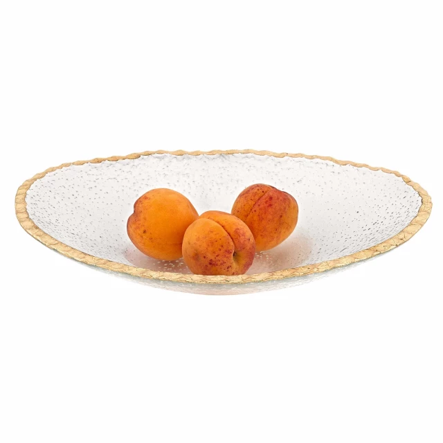Oval edge gold leaf serving bowl with fruits and tableware on display