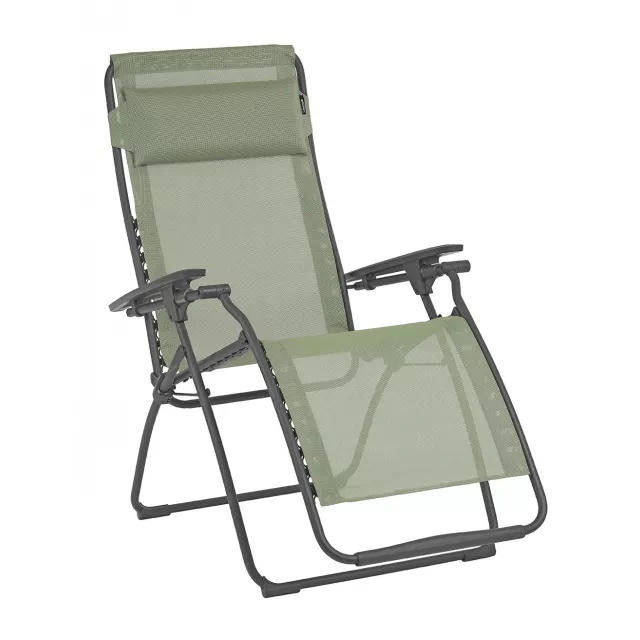 green gray metal zero gravity chair in a relaxed outdoor setting