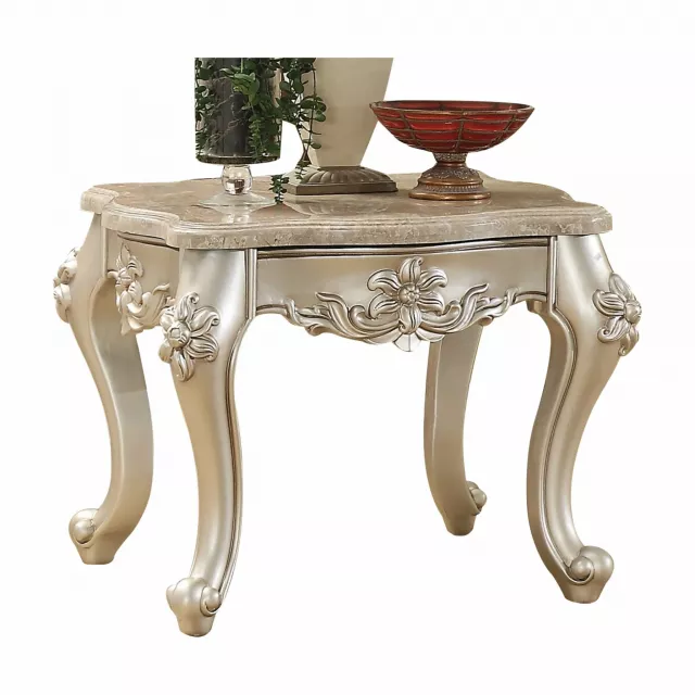 Marble champagne wood end table with beige serveware on rectangle surface in outdoor setting