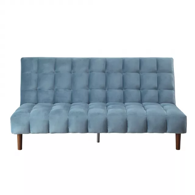 Teal velvet wood brown sleeper sofa with pillows in a comfortable outdoor setting