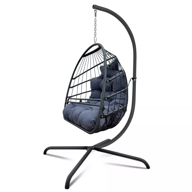 Beige black metal swing chair for indoor or outdoor decor