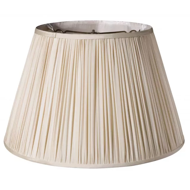 Grey slanted paperback pleated tafetta lampshade on wooden table