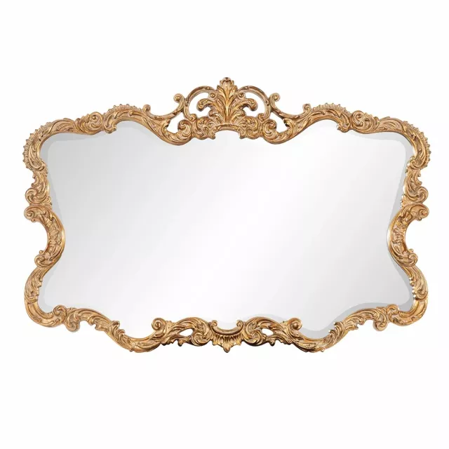 Gold leaf mirror with decorative textured frame showcasing art motif and natural material pattern
