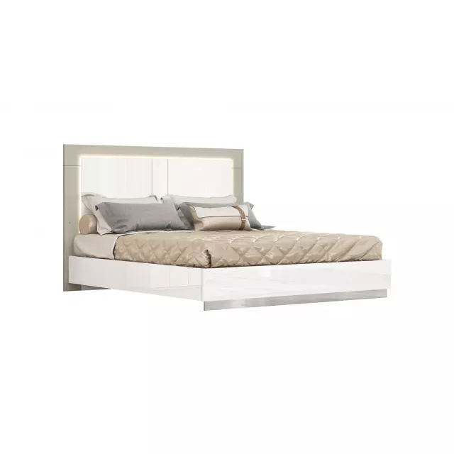 High gloss bed frame with LED headboard in modern bedroom setting