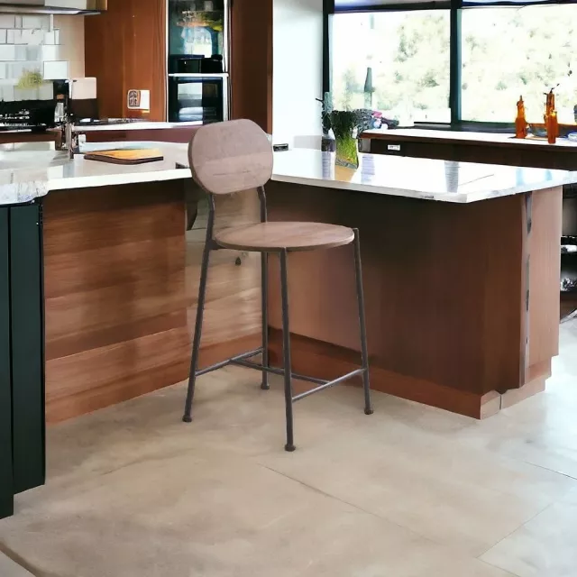 Low back bar height chair in kitchen with wood countertop and interior design elements