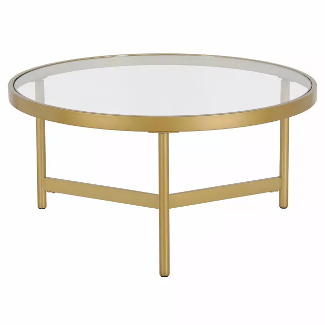 Gold glass steel round coffee table in a modern furniture setting