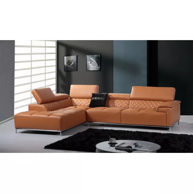 Brown leather sectional sofa with foam cushions and wood base in a comfortable living room setting