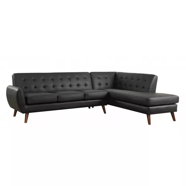 Leather L-shaped sofa chaise sectional in a comfortable studio couch design with wood accents
