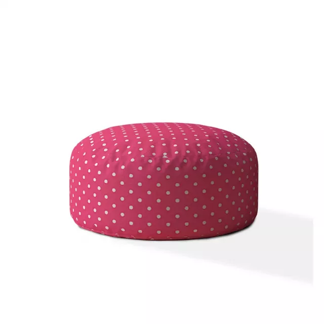 cotton round polka dot pouf ottoman in a styled room with patterned design elements