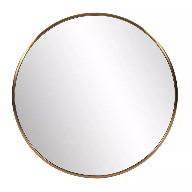 Antiqued brushed brass round wall mirror as a fashionable metal serveware accessory