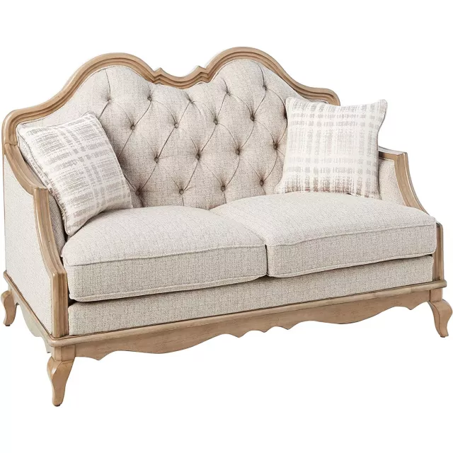 Beige brown linen loveseat with toss pillows in a comfortable studio couch design