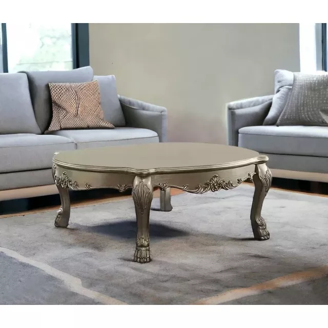 Bone solid manufactured wood coffee table with rectangle shape on wooden flooring