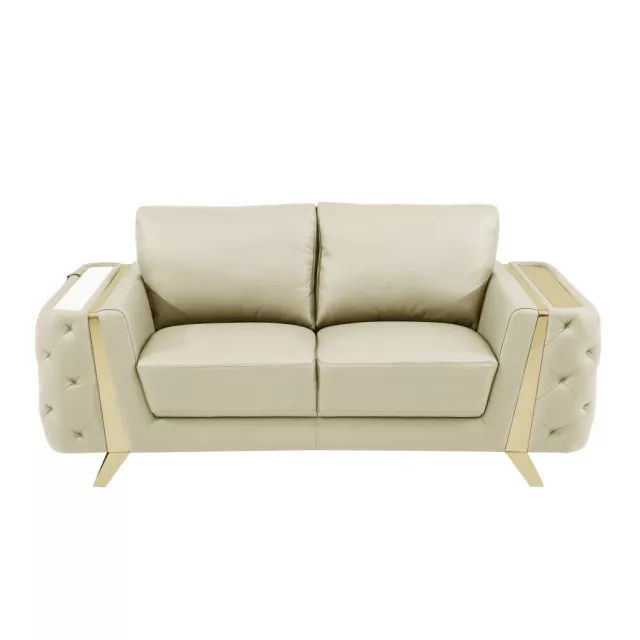 Beige gold genuine leather loveseat with brown comfort armrests in a studio setting
