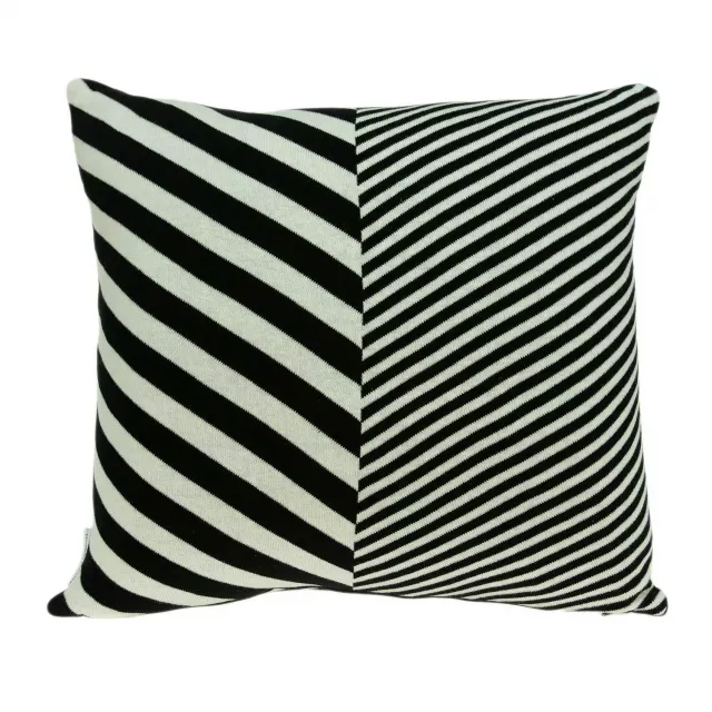 Black pillow cover with poly insert featuring a subtle pattern design