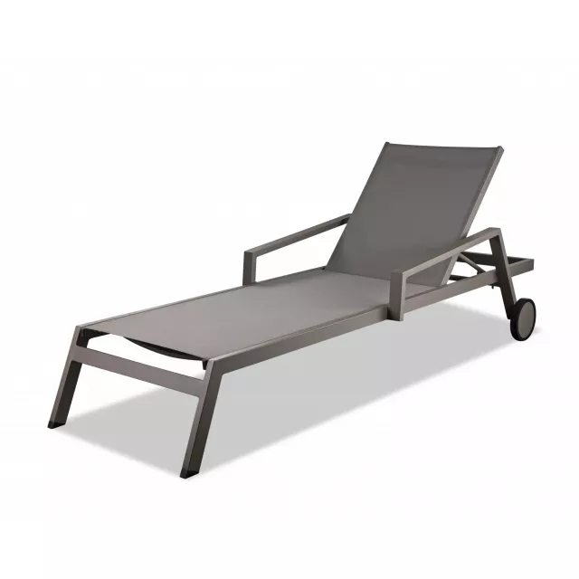 Taupe modern aluminum chaise lounges in outdoor setting