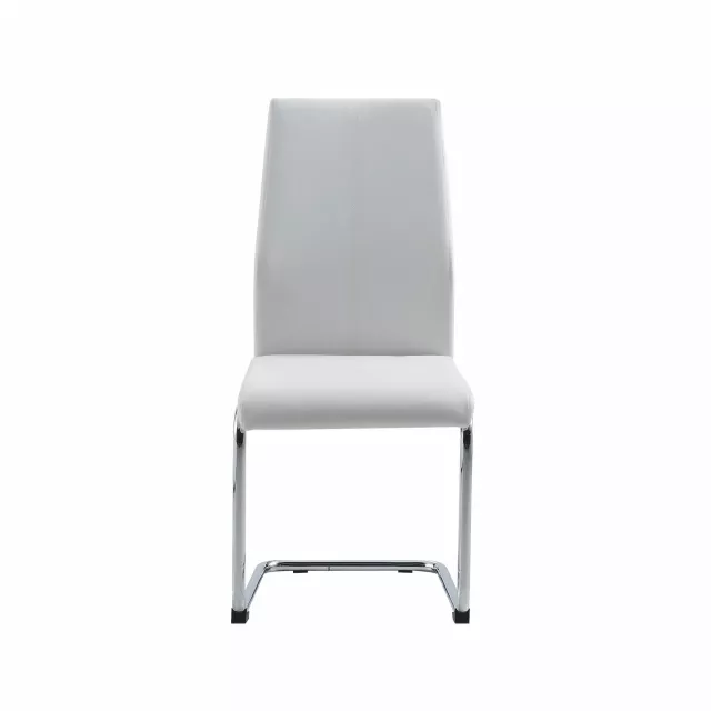White dining chairs with chrome metal base and comfortable armrests