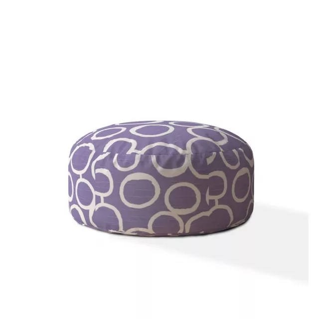 White cotton round pouf ottoman with abstract pattern and electric blue accents