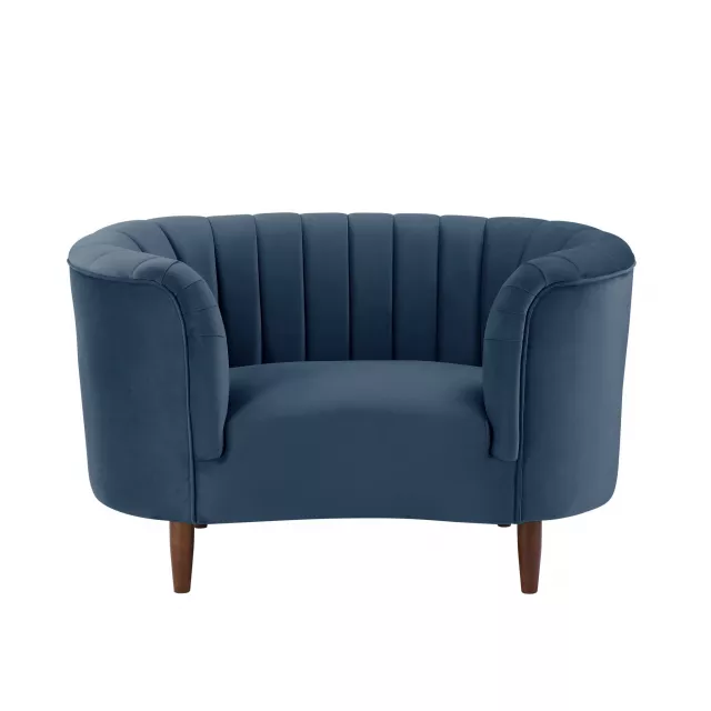 Blue velvet arm chair with black stripes and comfortable armrests
