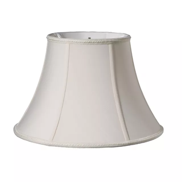 Cream slanted oval paperback shantung lampshade with metallic accents and circular base for home decor