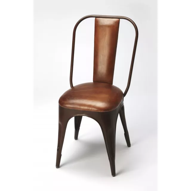 Brown faux leather side chair with wood legs and metal armrests