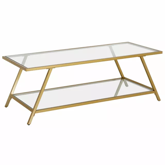 Gold glass steel coffee table with shelf in a modern outdoor setting